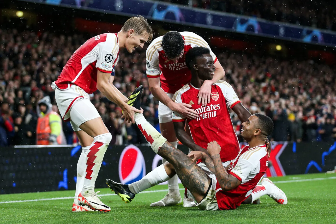 Arsenal's Gabriel Jesus (centre) celebrates with Bukayo Saka (top) and Martin Odegaard after scoring their side's third goal of the game during the UEFA Champions League Group B match at the Emirates Stadium, London. Picture date: Wednesday September 20, 2023. - Photo by Icon sport