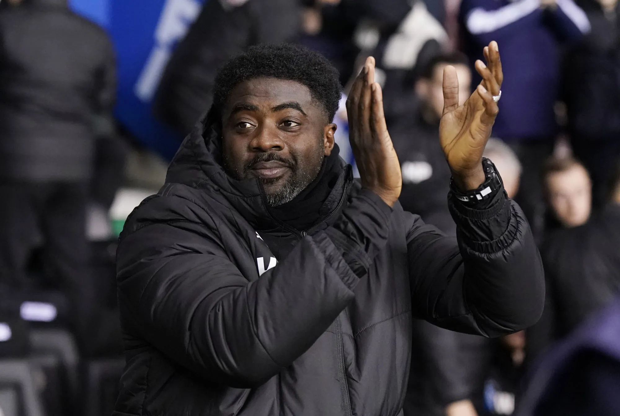 Wigan, England, 19th December 2022. Kolo Toure manager of Wigan Athletic applauds the fans in his first home game as their new manager during the Sky Bet Championship match at the DW Stadium, Wigan. Picture credit should read: Andrew Yates / Sportimage - Photo by Icon sport