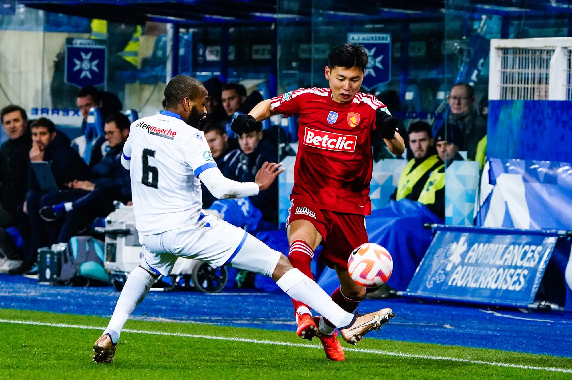 Youssouf M'CHANGAMA of Auxerre and Jung-Bin PARK of Rodez during the Round of 8 French Cup match between Auxerre and Rodez at Abbe-Deschamp Stadium on February 8, 2023 in Auxerre, France. (Photo by Sandra Ruhaut/Icon Sport)