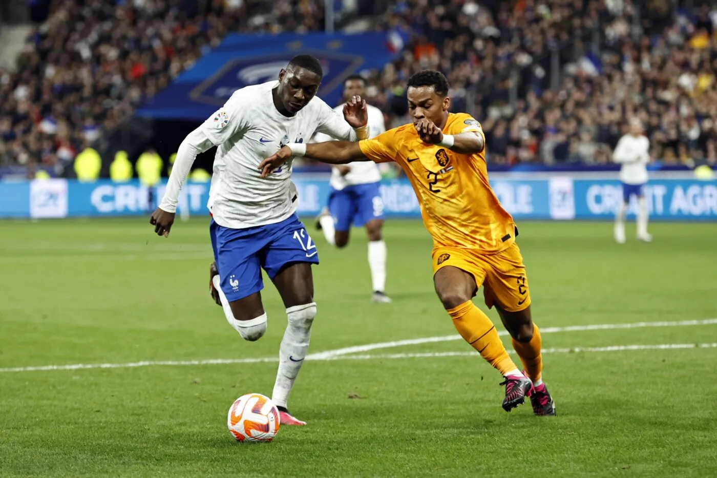 SAINT-DENIS - (lr) Randal Kolo Muani of France, Jurrien Timber of Holland during the UEFA EURO 2024 qualifying match between France and Netherlands at Stade de France on March 24, 2023 in Saint-Denis, France. ANP MAURICE VAN STONE - Photo by Icon sport