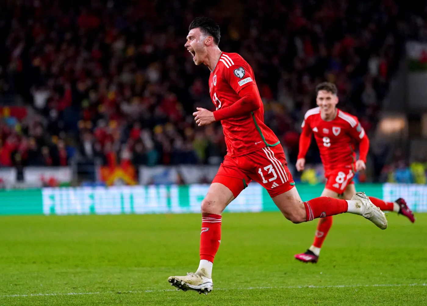 Wales' Kieffer Moore celebrates scoring their side's first goal of the game during the UEFA Euro 2024 qualifying group D match at the Cardiff City Stadium, Cardiff. Picture date: Tuesday March 28, 2023. - Photo by Icon sport