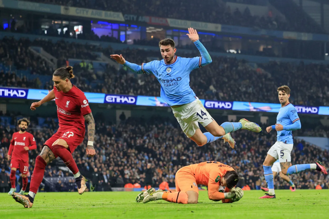 Aymeric Laporte #14 of Manchester City jumps over Stefan Ortega #18 of Manchester City during the Carabao Cup Fourth Round match Manchester City vs Liverpool at Etihad Stadium, Manchester, United Kingdom, 22nd December 2022 (Photo by Conor Molloy/News Images) in Manchester, United Kingdom on 12/22/2022. (Photo by Conor Molloy/News Images/Sipa USA) - Photo by Icon sport
