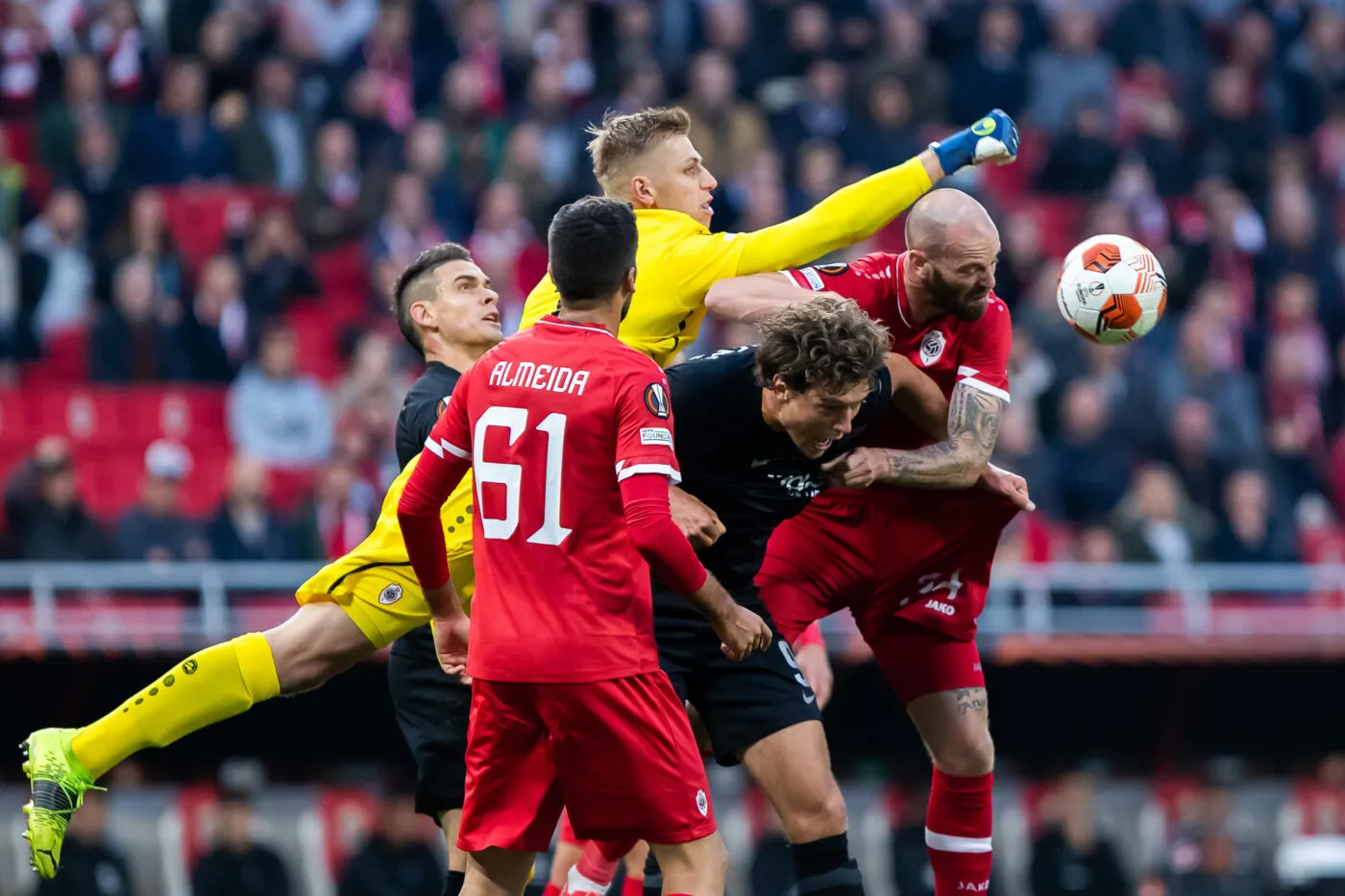 Antwerp's goalkeeper Jean Butez, Eintracht's Sam Lammers and Antwerp's Dorian Dessoleil pictured in action during a soccer game between Belgian Royal Antwerp FC and German Eindracht Frankfurt, Thursday 30 September 2021, in Antwerp, on the second day (out of six) of the Europa League group stage, in the Group D. BELGA PHOTO KRISTOF VAN ACCOM