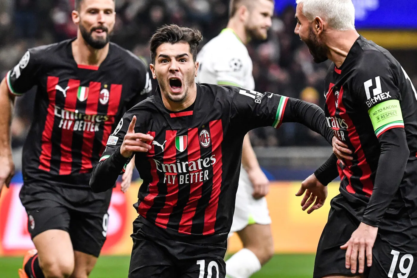 Brahim Diaz of AC Milan celebrates with Olivier Giroud and Theo Hernandez after scoring the goal of 1-0 during the Uefa Champions League football match between AC Milan and Tottenham Hotspur at San Siro stadium in Milano (Italy), February 14th 2023. Photo Andrea Staccioli / Insidefoto/Sipa USA No Sales in Italy - Photo by Icon sport