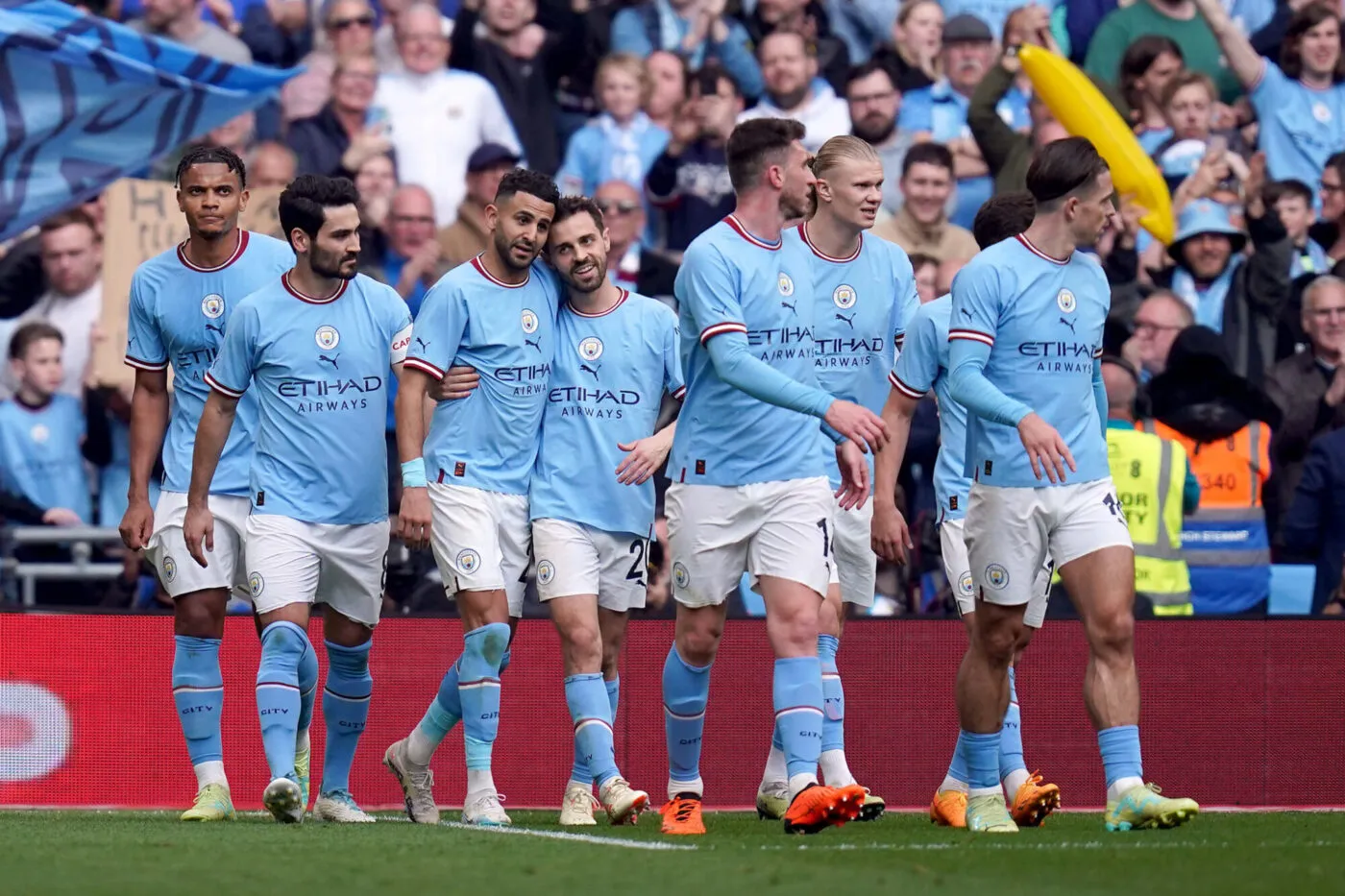 Manchester City's Riyad Mahrez celebrates with team-mates after scoring their side's third goal to complete his hat-trick during the Emirates FA Cup semi final match at Wembley Stadium, London. Picture date: Saturday April 22, 2023. - Photo by Icon sport