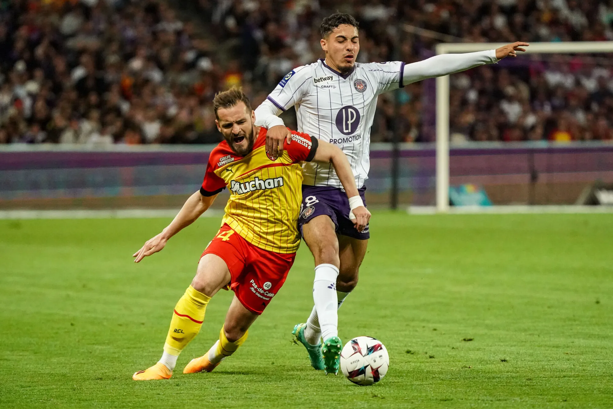 Jonathan GRADIT of RC Lens and Fares CHAIBI of Toulouse FC during the Ligue 1 Uber Eats match between Toulouse and Lens at Stadium Municipal on May 2, 2023 in Toulouse, France. (Photo by Pierre Costabadie/Icon Sport)