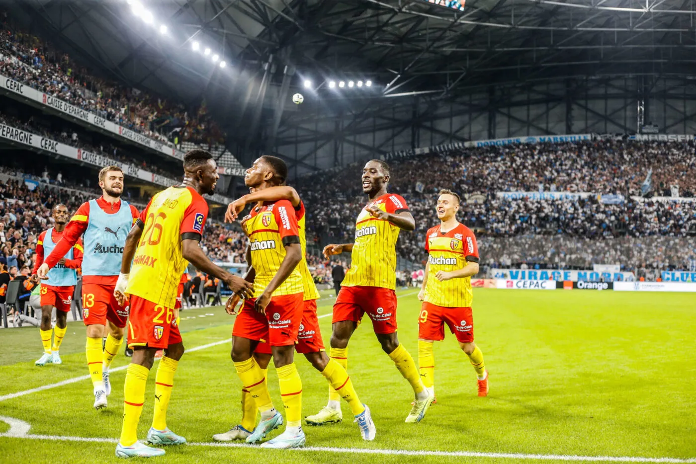David PEREIRA DA COSTA of Lens celebrate his goal with his team-mates during the Ligue 1 Uber Eats match between Marseille and Lens at Orange Velodrome on October 22, 2022 in Marseille, France. (Photo by Johnny Fidelin/Icon Sport)