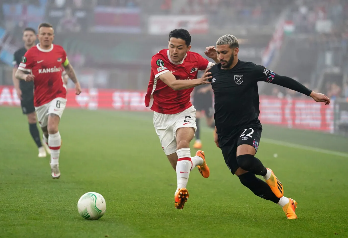 AZ Alkmaar's Yukinari Sugawara and West Ham United's Said Benrahma (right) battle for the ball during the UEFA Europa Conference League semi-final at the AFAS Stadium, Alkmaar. Picture date: Thursday May 18, 2022. - Photo by Icon sport