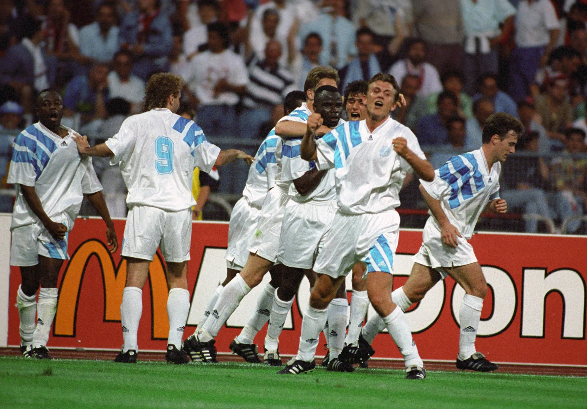Olympic de Marseille&rsquo;s team celebrate a goal of Basile BOLI with Franck Sauzee in Munich, on 26 May 1993. | usage worldwide<br />Photo by Icon Sport
