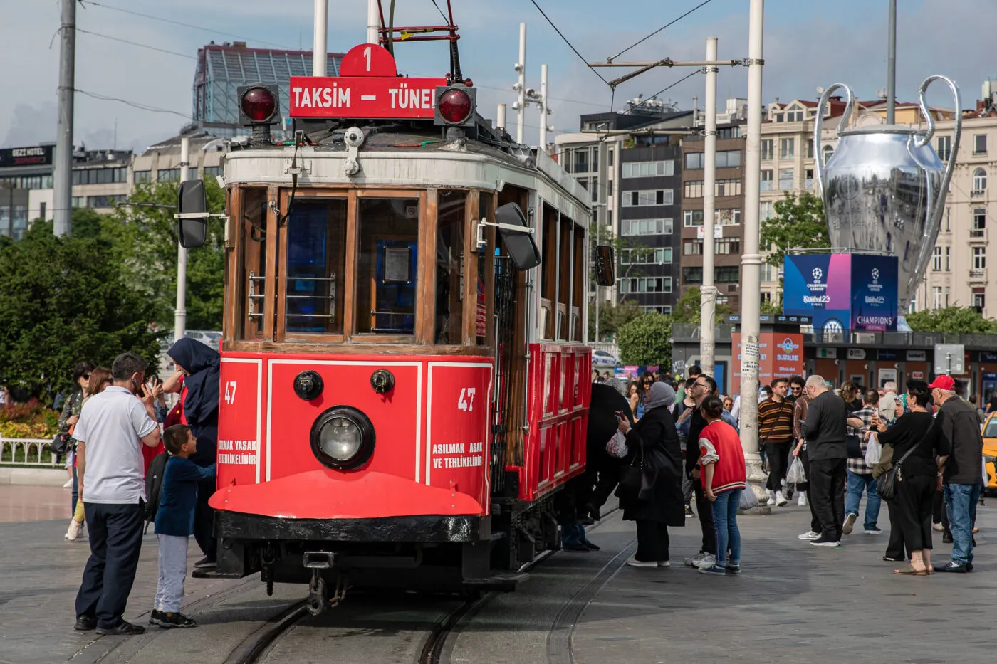With the nostalgic tram standing in Taksim square, the 2023 UEFA Champions League giant trophy seen in the background. Manchester City and Inter will face each other in the final match that will determine the champion of the UEFA Champions League season on Saturday, June 10, 2023 at Ataturk Olympic Stadium. As part of the festival, a giant Champions League trophy and a model of a soccer ball were seen in Taksim. It was met with intense interest from domestic and foreign tourists. (Photo by Onur Dogman / SOPA Images/Sipa USA) - Photo by Icon sport