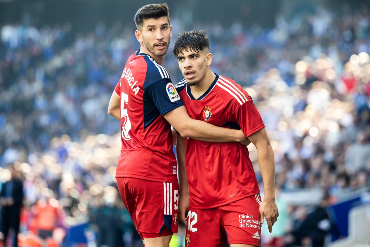 David Garcia of CA Osasuna and Abde Ezzalzouli of CA Osasuna during the Liga match between RCD Espanyol and CA Osasuna at RCDE Stadium in Cornella, Spain. - Photo by Icon sport