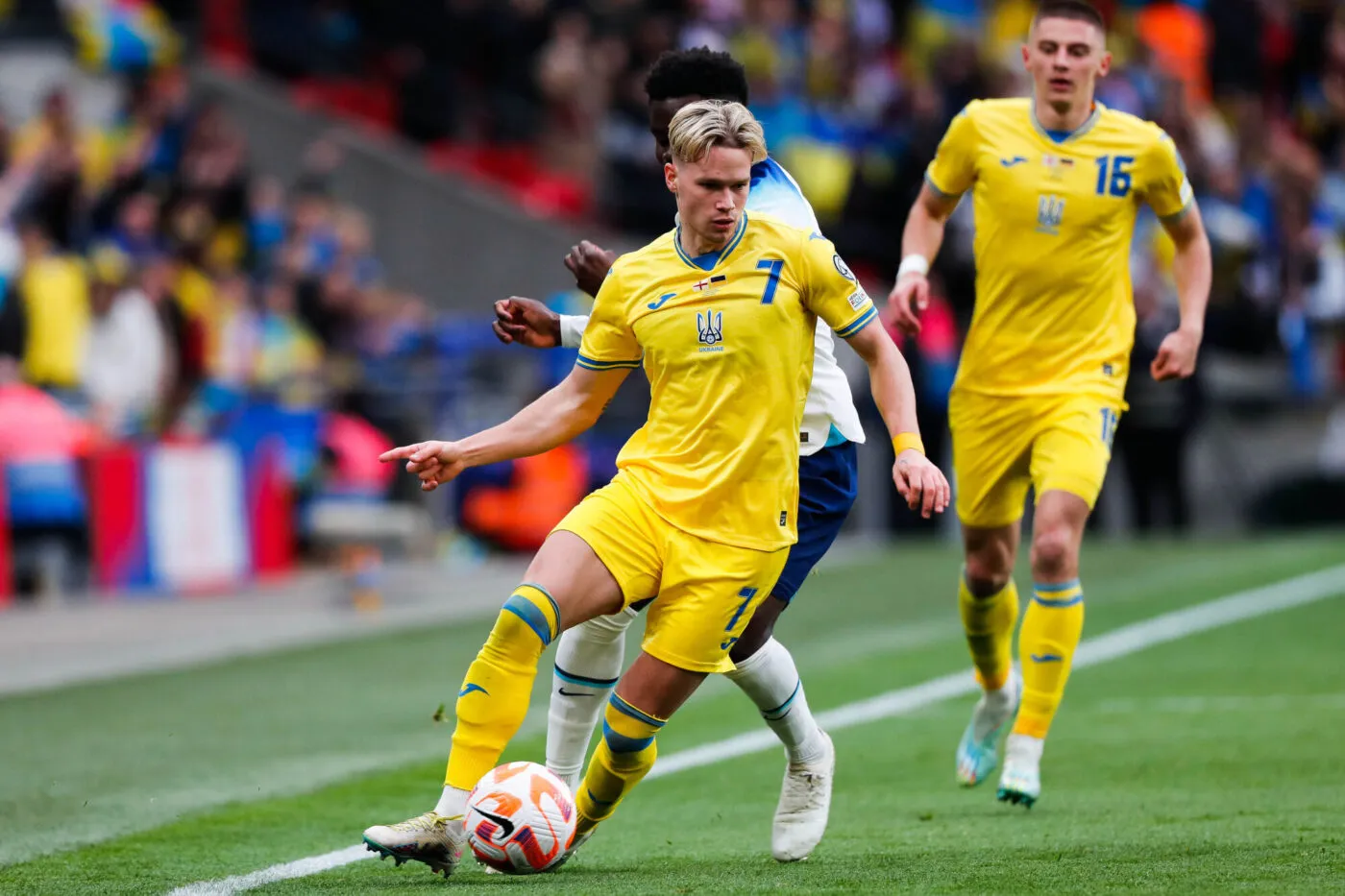 Bukayo Saka of England and Mykhailo Mudryk of Ukraine in action during the UEFA Euro 2024 Qualifiers Group C match at Wembley Stadium, London