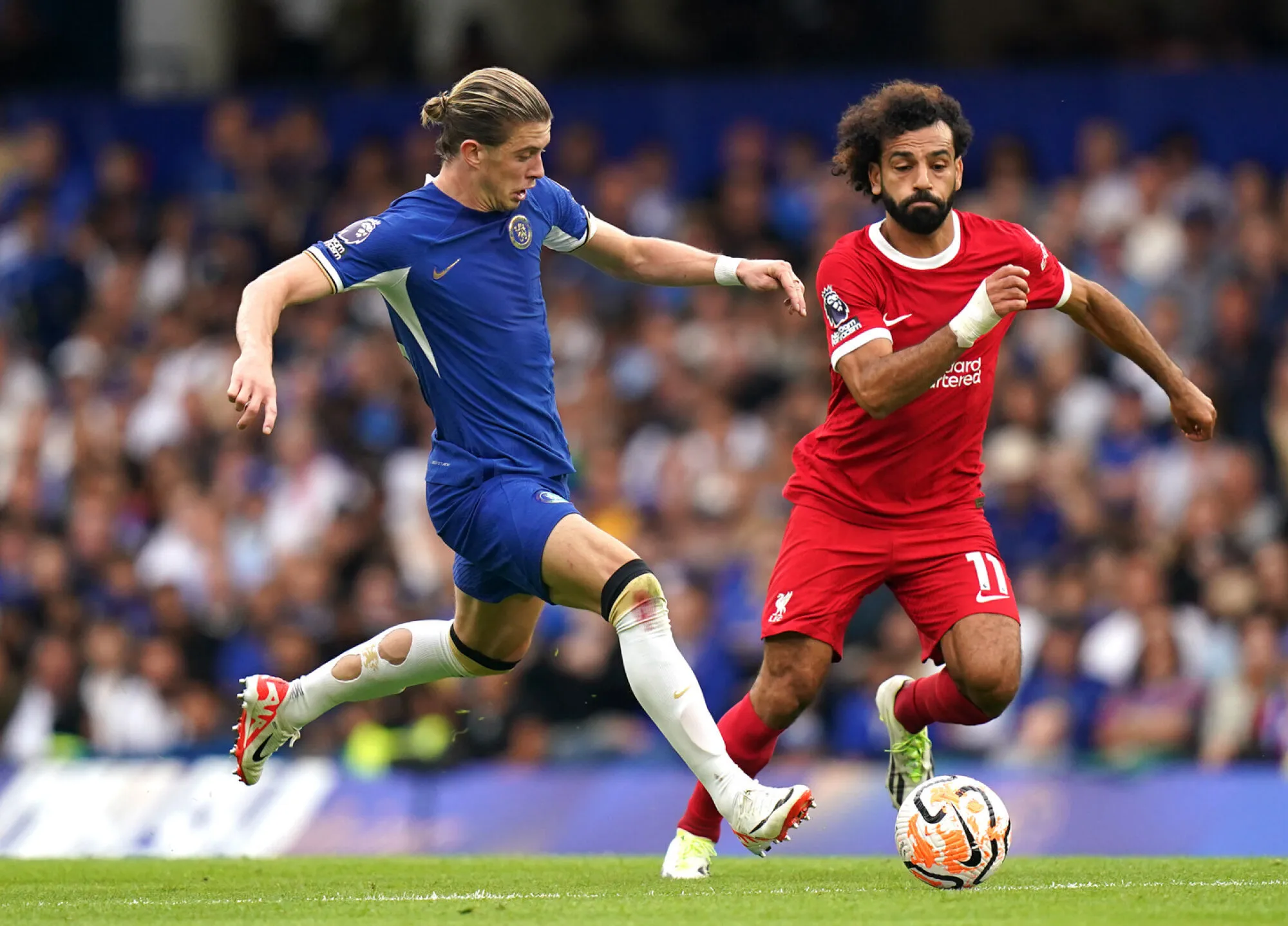 Liverpool's Mohamed Salah (right) and Chelsea's Conor Gallagher battle for the ball during the Premier League match at Stamford Bridge, London. Picture date: Sunday August 13, 2023. - Photo by Icon sport
