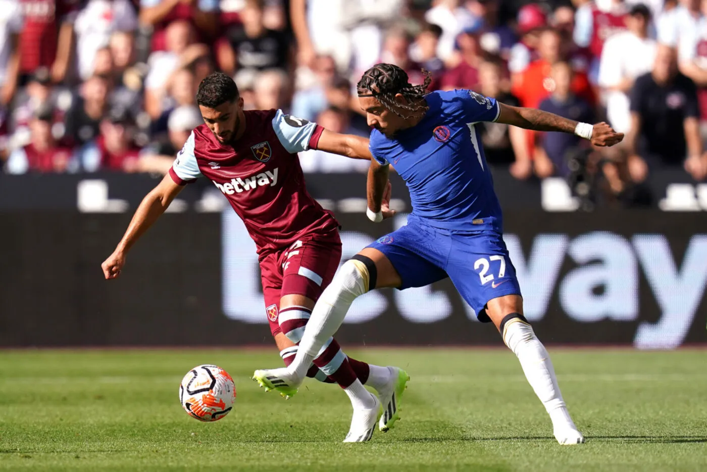 West Ham United's Said Benrahma (left) and Chelsea's Malo Gusto battle for the ball during the Premier League match at the London Stadium, London. Picture date: Sunday August 20, 2023. - Photo by Icon sport