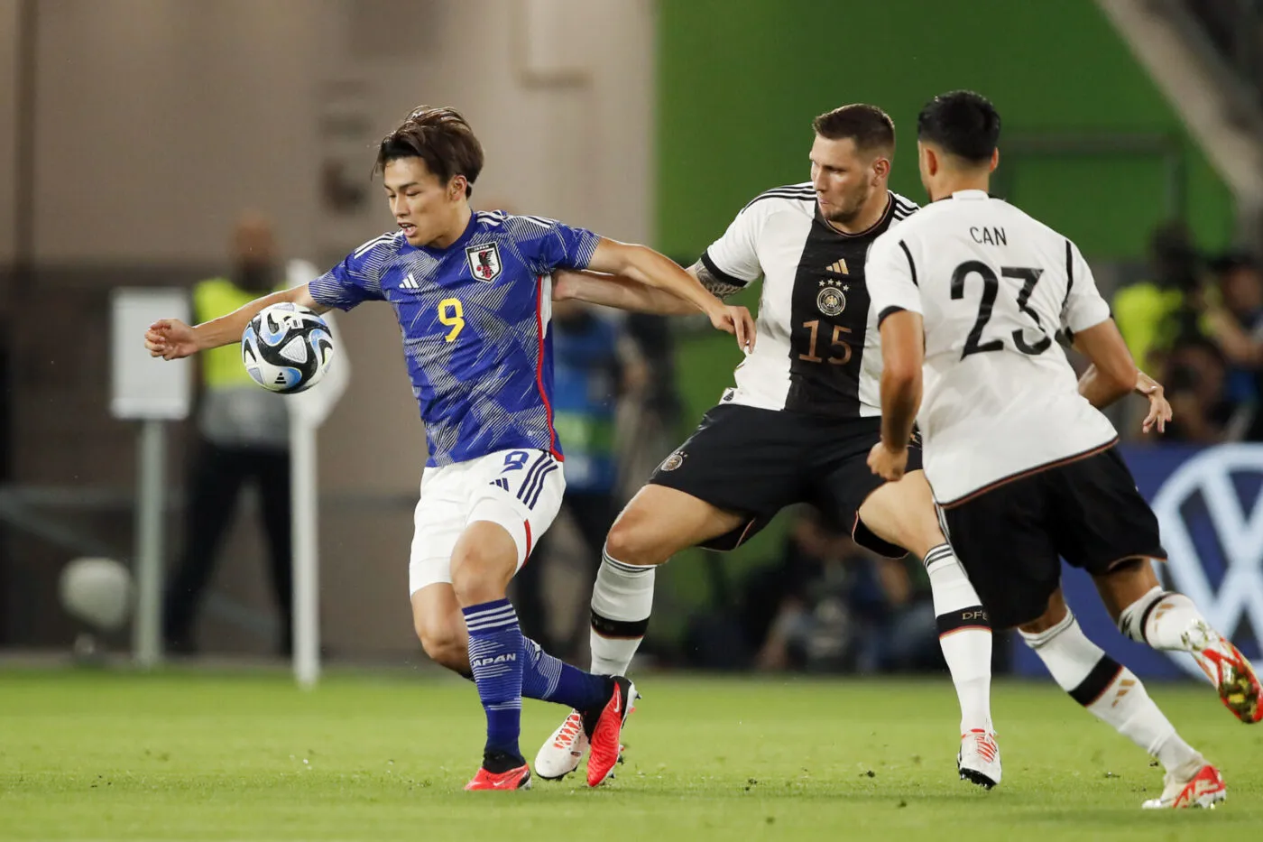 WOLFSBURG - (l-r) Ayase Ueda of Japan, Niklas Sule of Germany, Emre Can of Germany during the friendly Interland match between Germany and Japan at the Volkswagen Arena on September 9, 2023 in Wolfsburg, Germany. ANP | Hollandse Hoogte | BART STOUTJESDIJK - Photo by Icon sport