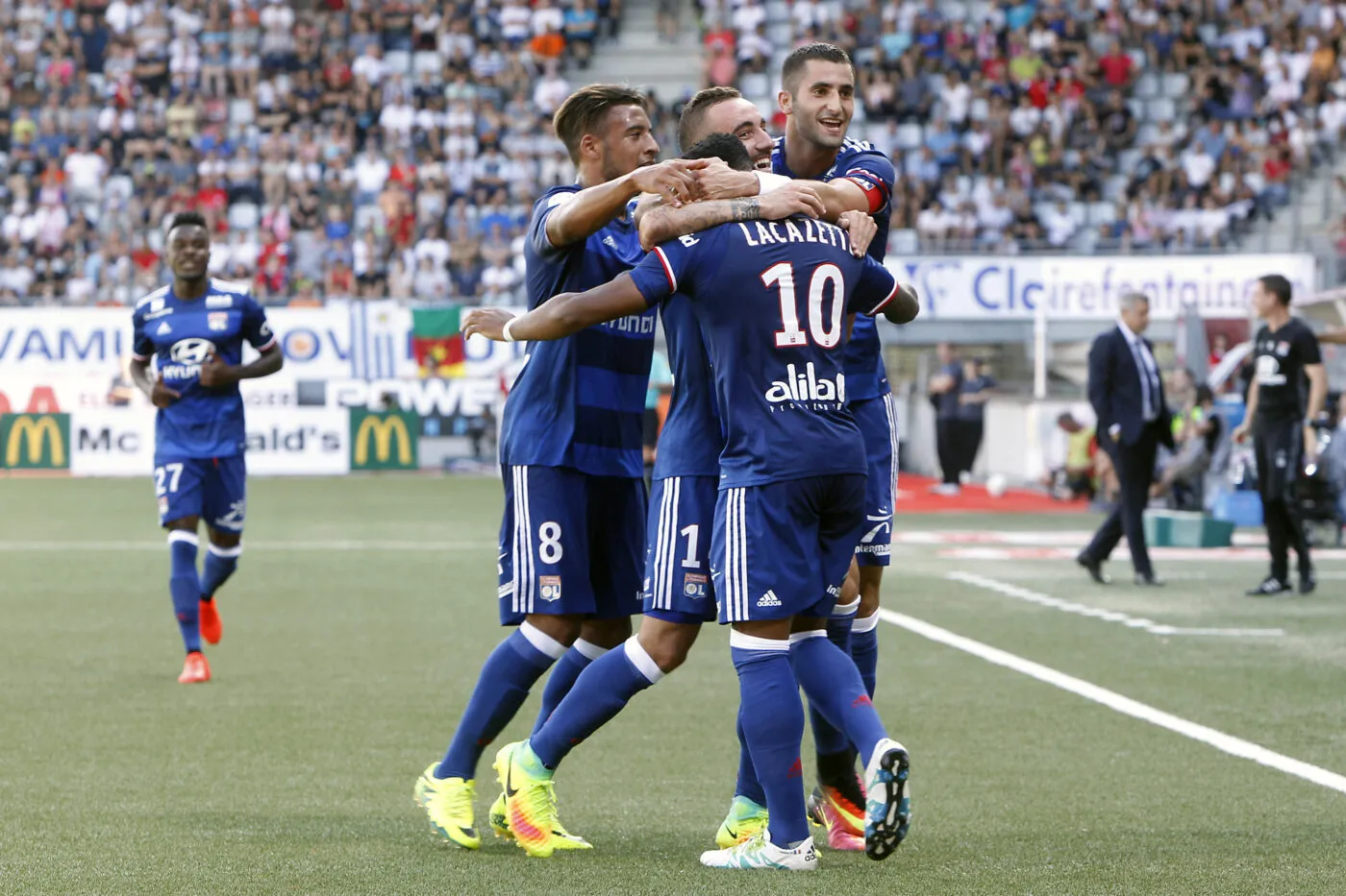 Corentin Tolisso of Lyon and Sergi Darder Moll of Lyon and Maxime Gonalons of Lyon and Alexandre Lacazette of Lyon celebrates scoring his goal  during the football Ligue 1 match between As Nancy Lorra