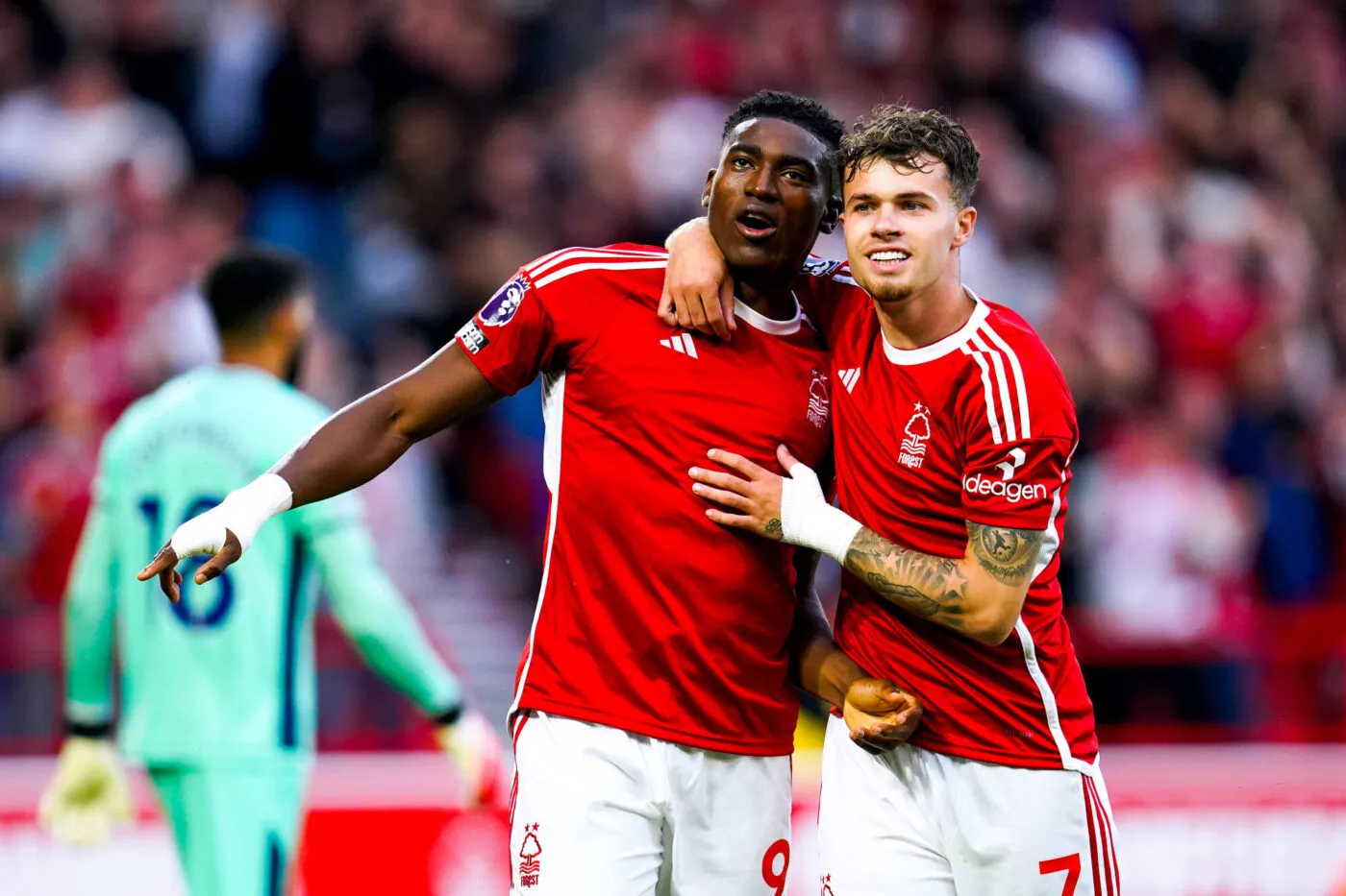 Nottingham Forest's Taiwo Awoniyi (left) celebrates with team-mate Neco Williams after scoring their side's first goal of the game during the Premier League match at the City Ground, Nottingham. Picture date: Friday August 18, 2023. - Photo by Icon sport