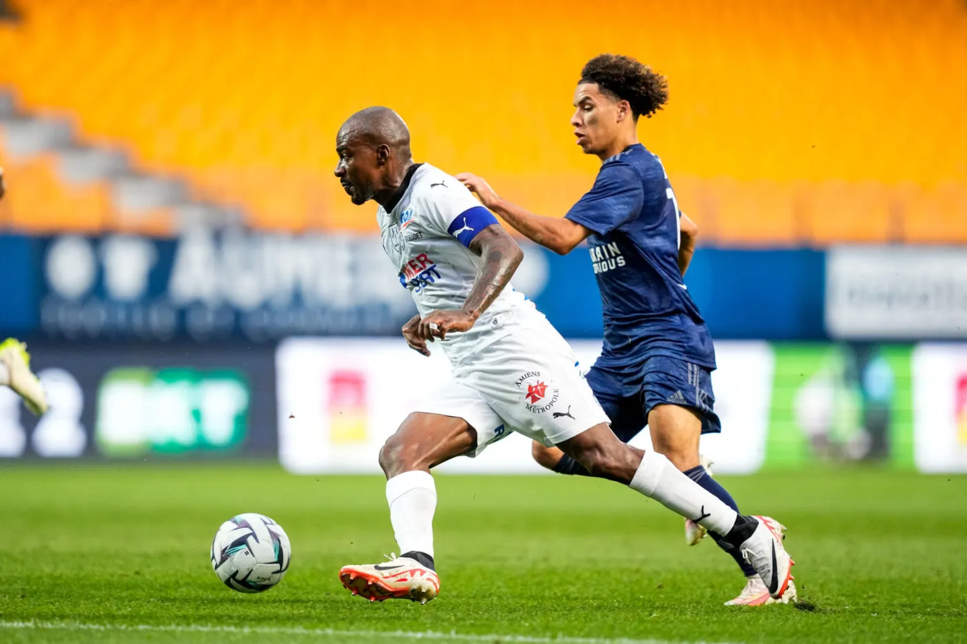 Ilan KEBBAL of Paris FC and Gael KAKUTA of Amiens SC during the Ligue 2 BKT match between Paris Football Club and Amiens Sporting Club at Stade de l'Aube - Troyes  on September 16, 2023 in Troyes, France. (Photo by Hugo Pfeiffer/Icon Sport)