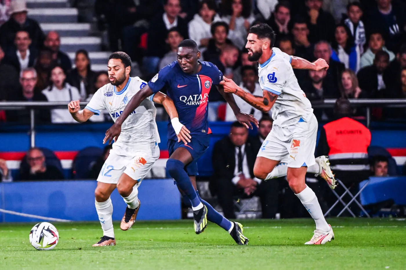 Renan LODI of Marseille, Randal KOLO MUANI of PSG and Samuel GIGOT of Marseille during the Ligue 1 Uber Eats match between Paris Saint-Germain Football Club and Olympique de Marseille at Parc des Princes on September 24, 2023 in Paris, France. (Photo by Anthony Dibon/Icon Sport)