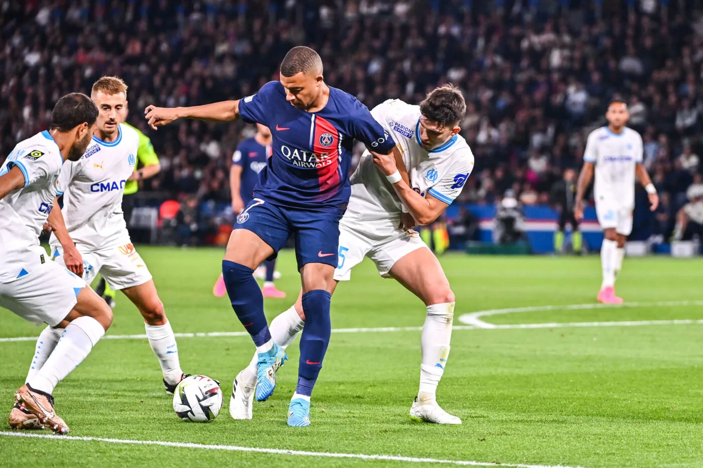 Kylian MBAPPE of PSG and Leonardo BALERDI of Marseille during the Ligue 1 Uber Eats match between Paris Saint-Germain Football Club and Olympique de Marseille at Parc des Princes on September 24, 2023 in Paris, France. (Photo by Anthony Dibon/Icon Sport)