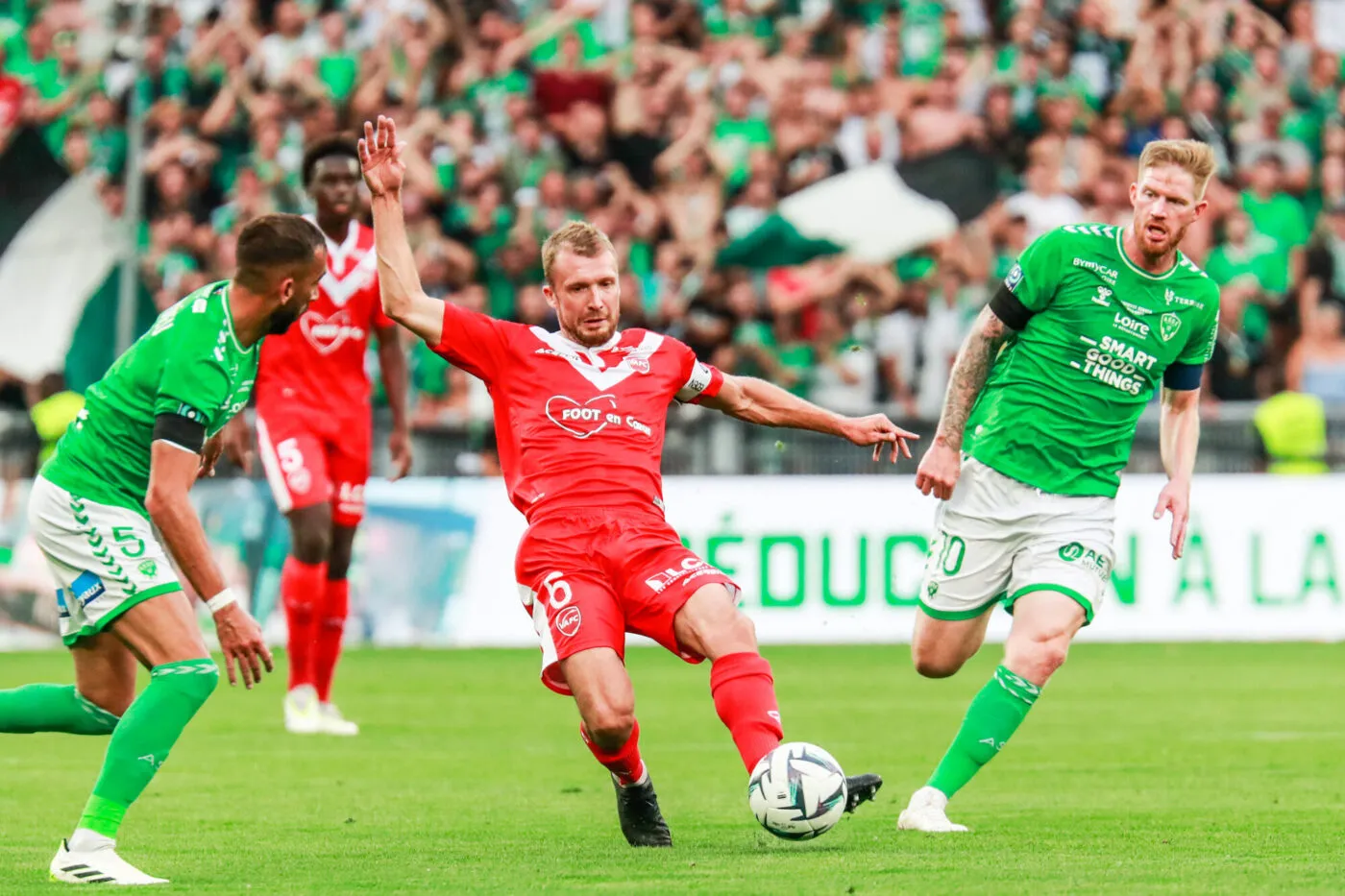 Julien MASSON of Valenciennes and Gaetan CHARBONNIER of Saint Etienne during the Ligue 2 BKT match between Association Sportive de Saint-Etienne and Valenciennes Football Club at Stade Geoffroy-Guichard on September 2, 2023 in Saint-Etienne, France. (Photo by Romain Biard/Icon Sport)
