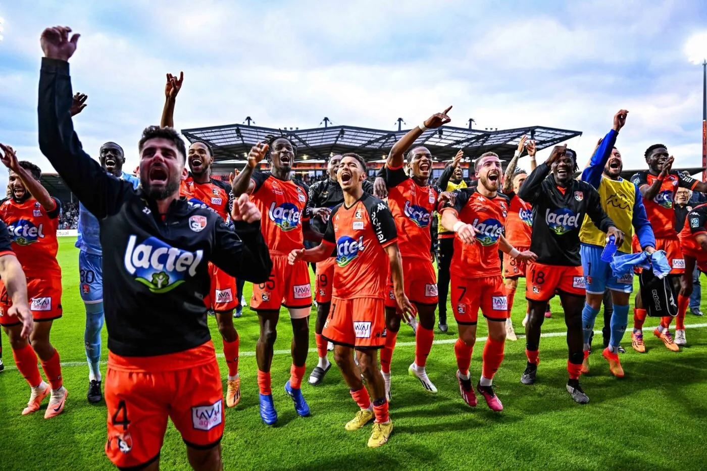 Players of Laval celebrate their victory with their fans after the French Ligue 2 BKT soccer match between Laval and Angers SCO at Stade Francis-Le Basser on August 5, 2023 in Laval, France. (Photo by Baptiste Fernandez/Icon Sport)