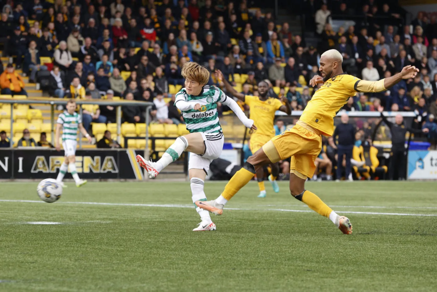 Celtic's Kyogo Furuhashi (left) has a attempt at goal during the cinch Premiership match at the Tony Macaroni Arena, Livingston. Picture date: Saturday September 23, 2023. - Photo by Icon sport