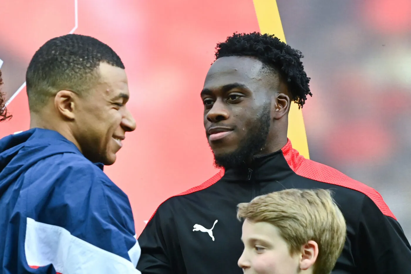 Kylian MBAPPE of PSG and Arnaud KALIMUENDO of Stade Rennais during the Ligue 1 Uber Eats match between Paris and Rennes at Parc des Princes on March 19, 2023 in Paris, France. (Photo by Anthony Dibon/Icon Sport)