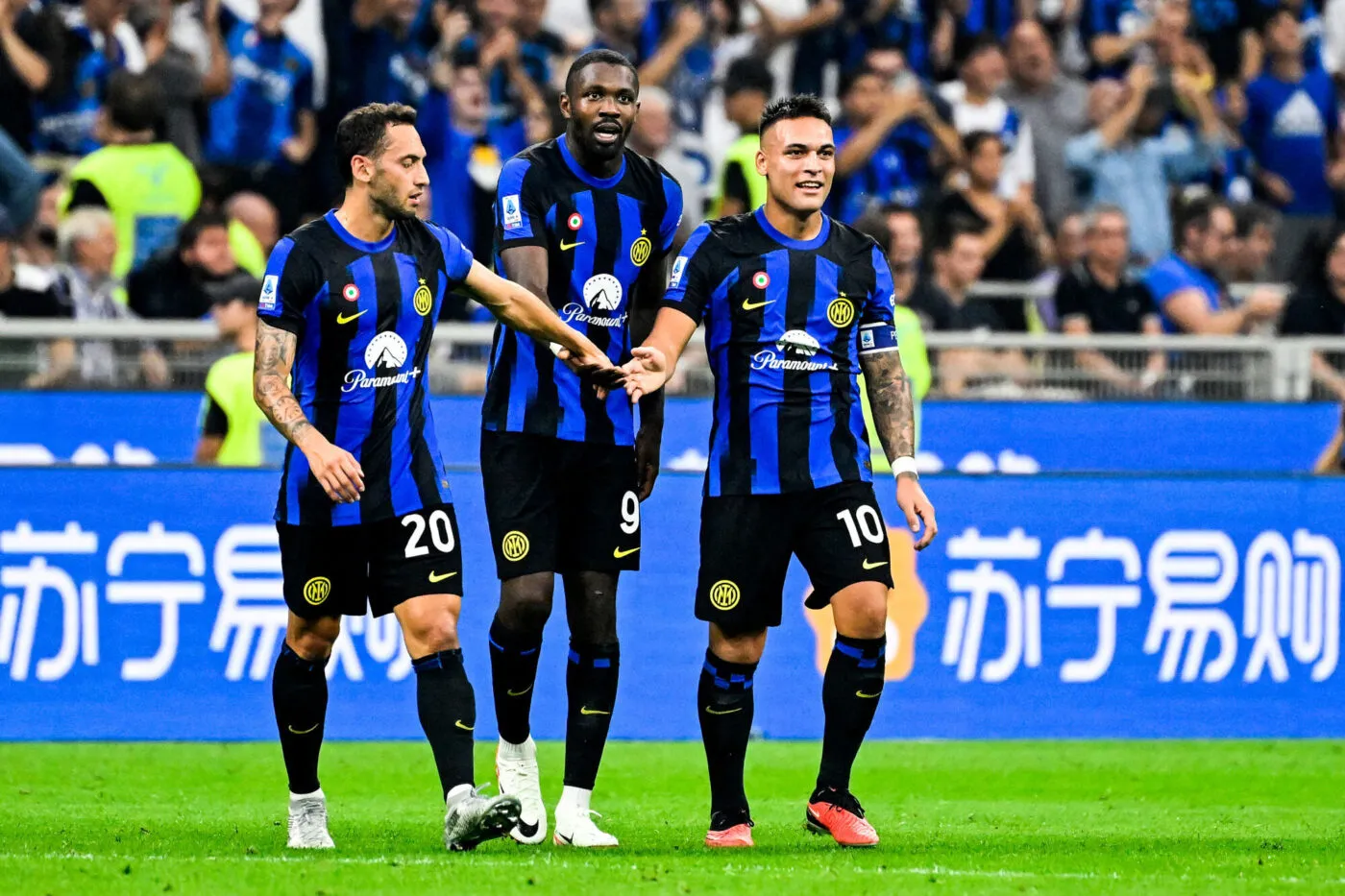 Marcus Thuram of FC Internazionale celebrates with Lautaro Martinez (r) and Hakan Calhanoglu (l) after scoring the goal of 2-0 during the Serie A football match between FC Internazionale and AC Milan at San Sirostadium stadium in Milan (Italy), September 16th, 2023./Sipa USA No Sales in Italy - Photo by Icon sport