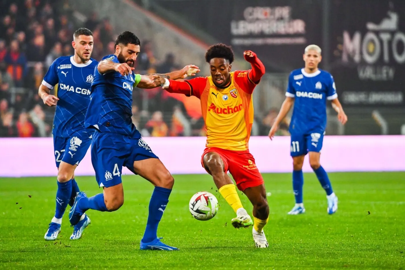 Elye WAHI of Lens and Samuel GIGOT of Marseille during the Ligue 1 Uber Eats match between Racing Club de Lens and Olympique de Marseille at Stade Bollaert-Delelis on November 12, 2023 in Lens, France. (Photo by Anthony Dibon/Icon Sport)