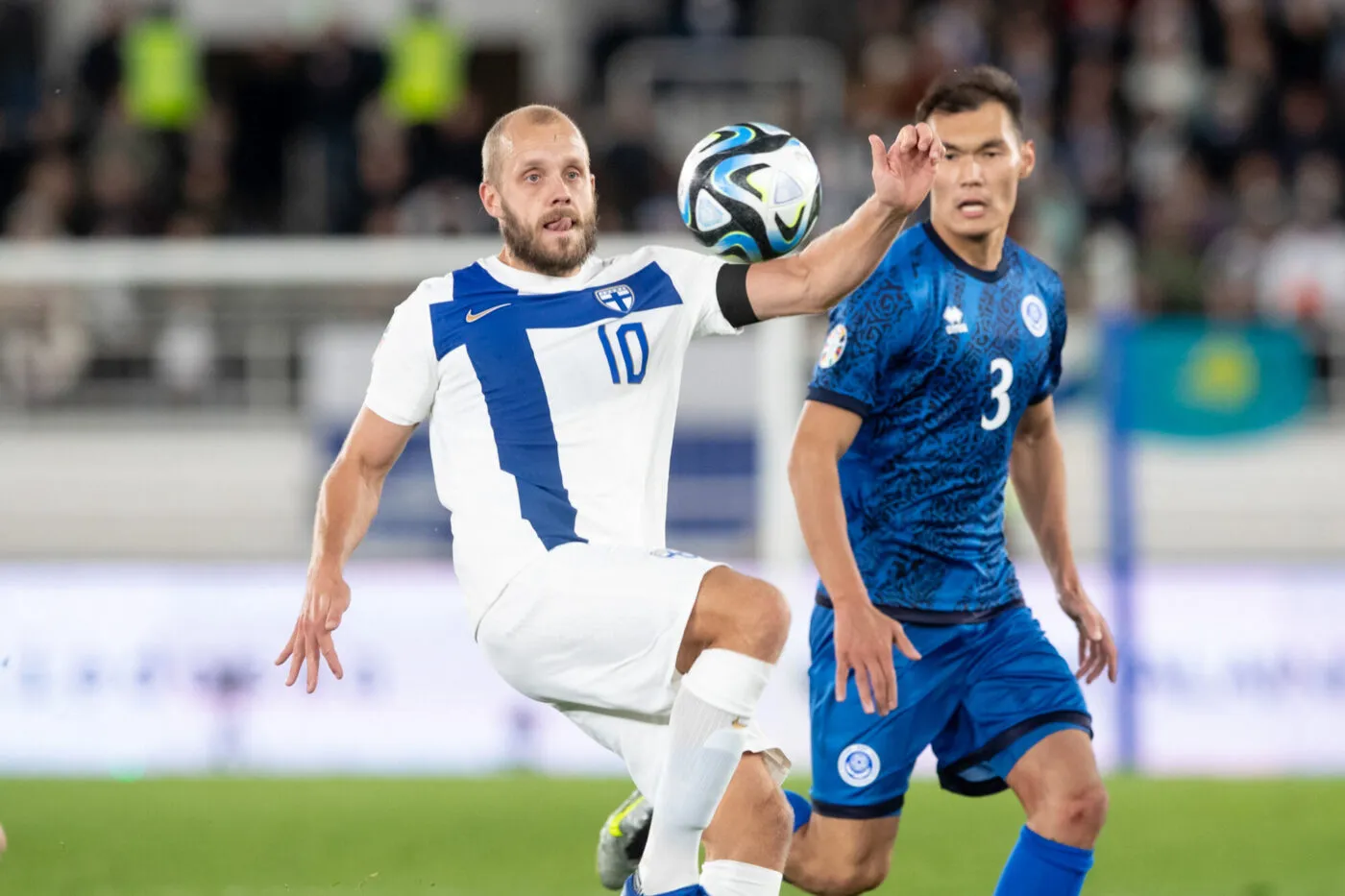 Teemu Pukki of Finland and Nuraly Alip of Kazakhstan during the Uefa European qualifiers group H match between Finland and Kazakhstan at the Olympic Stadium on 17. October 2023 in Helsinki, Finland. (Tomi Hänninen/Newspix24) (Tomi Hänninen/Newspix24) - Photo by Icon sport