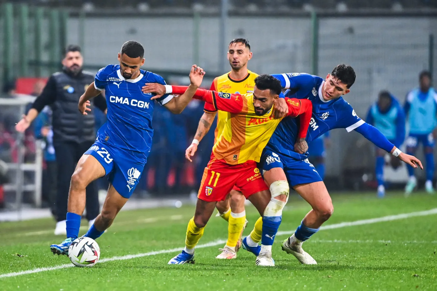 Iliman NDIAYE, Leonardo BALERDI of Marseille and Angelo FULGINI of Lens during the Ligue 1 Uber Eats match between Racing Club de Lens and Olympique de Marseille at Stade Bollaert-Delelis on November 12, 2023 in Lens, France. (Photo by Anthony Dibon/Icon Sport)