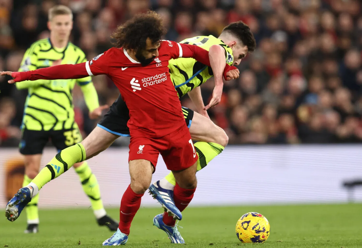 Liverpool, England, 23rd December 2023. Mohamed Salah of Liverpool tackled by Declan Rice of Arsenal during the Premier League match at Anfield, Liverpool. Picture credit should read: Darren Staples / Sportimage - Photo by Icon sport