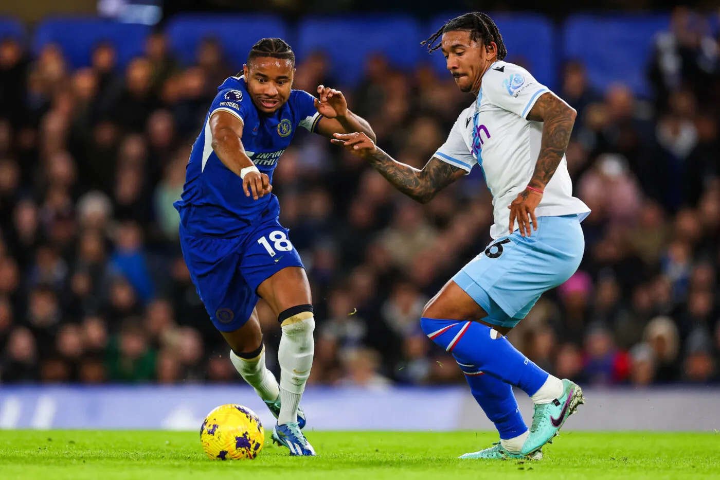 27th December 2023; Stamford Bridge, Chelsea, London, England: Premier League Football, Chelsea versus Crystal Palace; Christopher Nkunku of Chelsea takes on Chris Richards of Crystal Palace - Photo by Icon sport