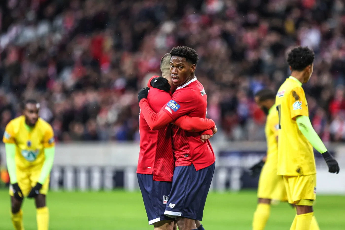 Jonathan DAVID of Lille celebrates his goal with Edon ZHEGROVA during the French Cup match between LOSC Lille and Golden Lion FC at Stade Pierre-Mauroy on January 6, 2024 in Lille, France. (Photo by Johnny Fidelin/Icon Sport)