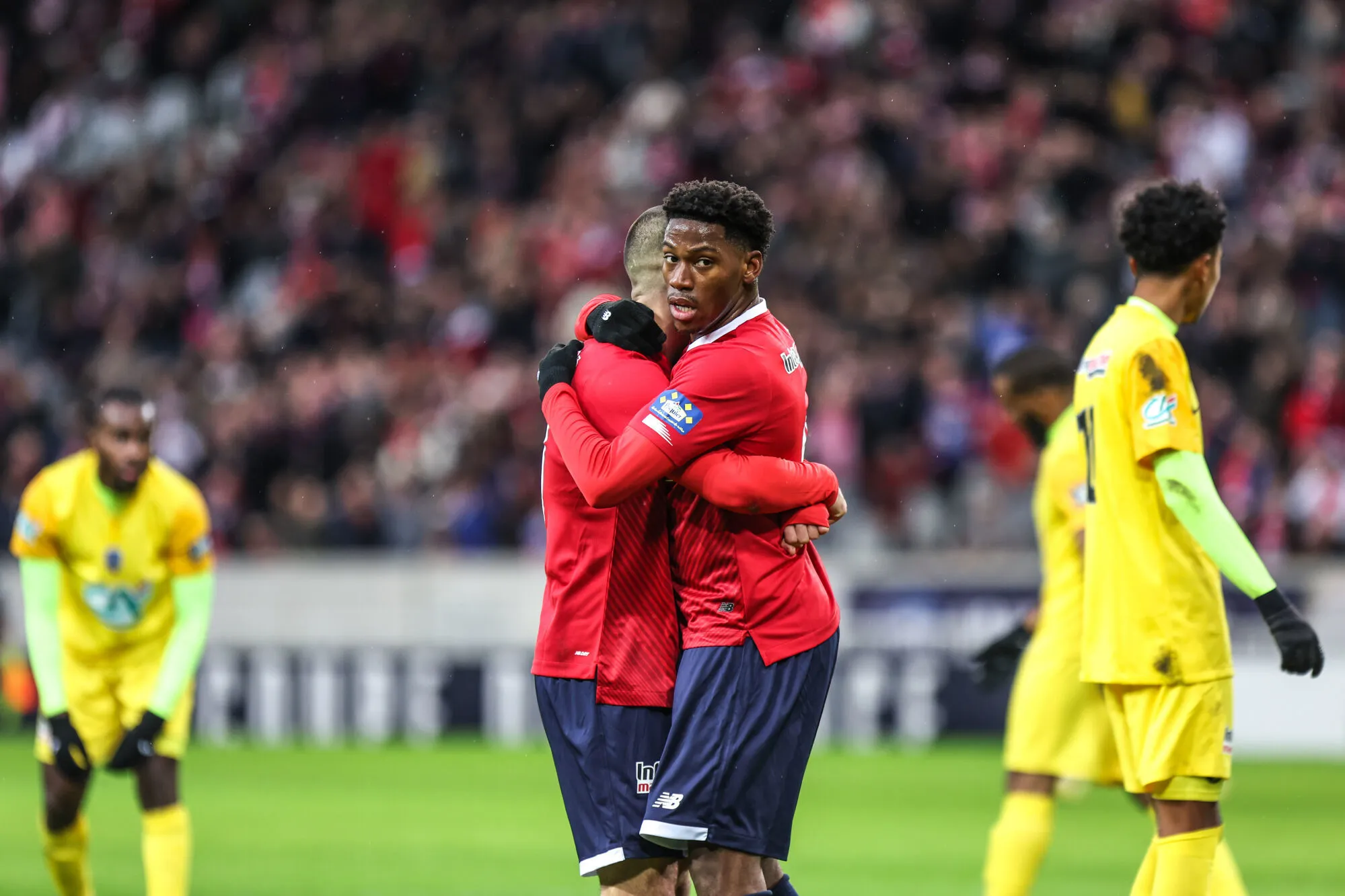 Jonathan DAVID of Lille celebrates his goal with Edon ZHEGROVA during the French Cup match between LOSC Lille and Golden Lion FC at Stade Pierre-Mauroy on January 6, 2024 in Lille, France. (Photo by Johnny Fidelin/Icon Sport)