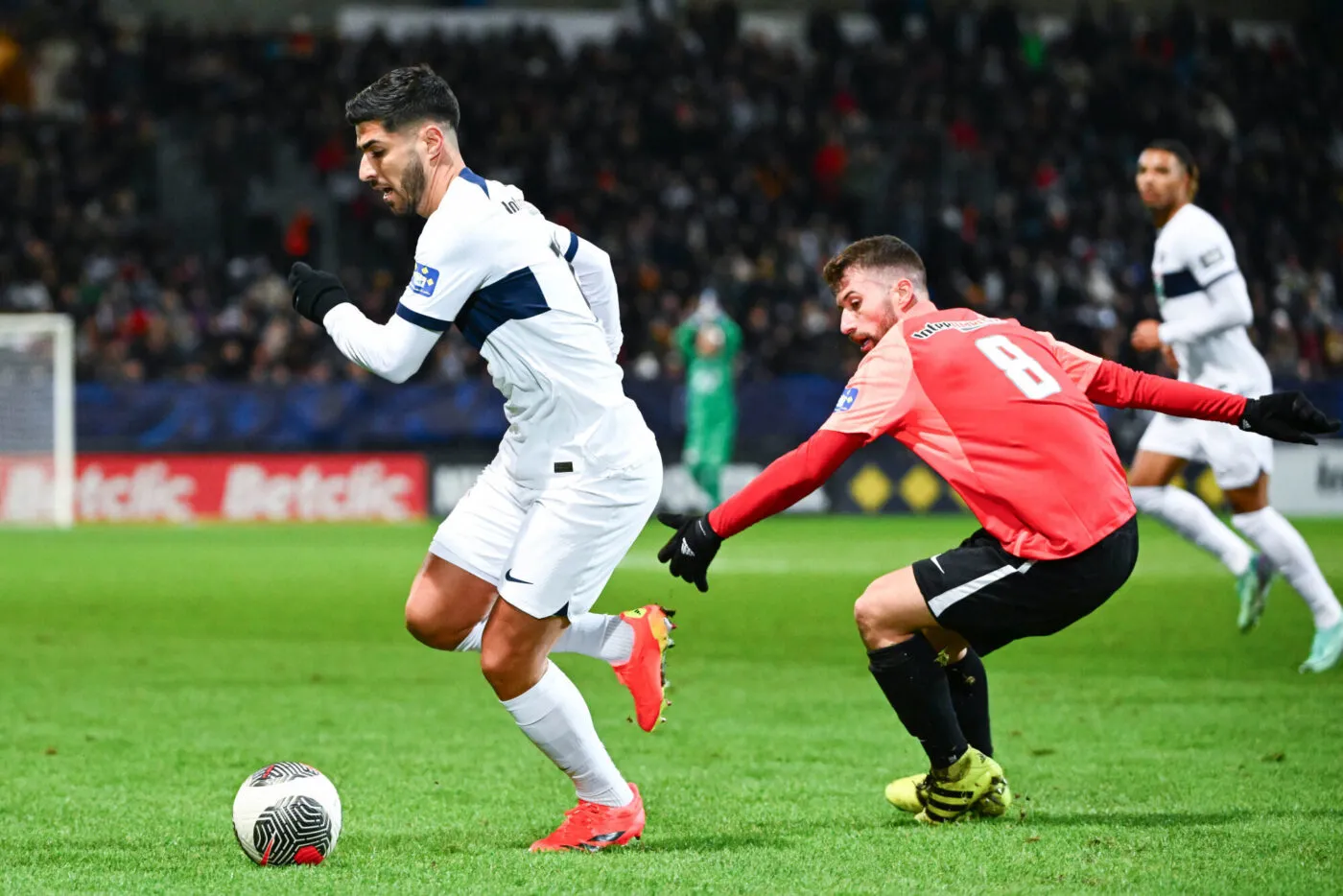 Marco ASENSIO of PSG and Thomas CALMETTES of Revel during the French Cup match between Union Sportive Reveloise and Paris Saint-Germain at Stade Pierre Fabre on January 7, 2024 in Castres, France. (Photo by Anthony Dibon/Icon Sport)