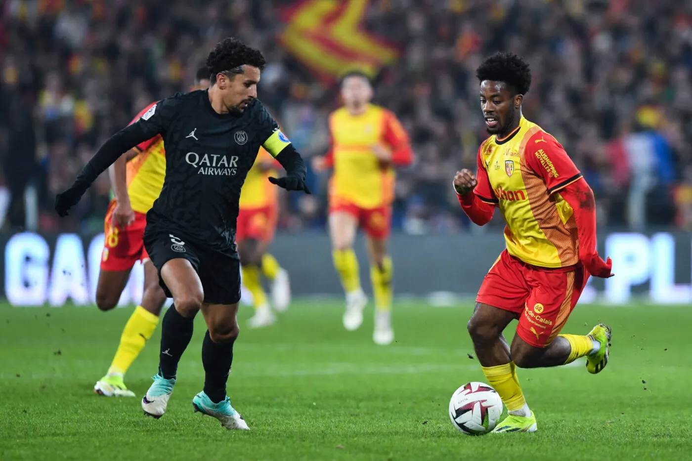 MARQUINHOS of PSG and Elye WAHI of Lens during the Ligue 1 Uber Eats match between RC Lens and Paris Saint-Germain at Stade Bollaert-Delelis on January 14, 2024 in Lens, France. (Photo by Daniel Derajinski/Icon Sport)