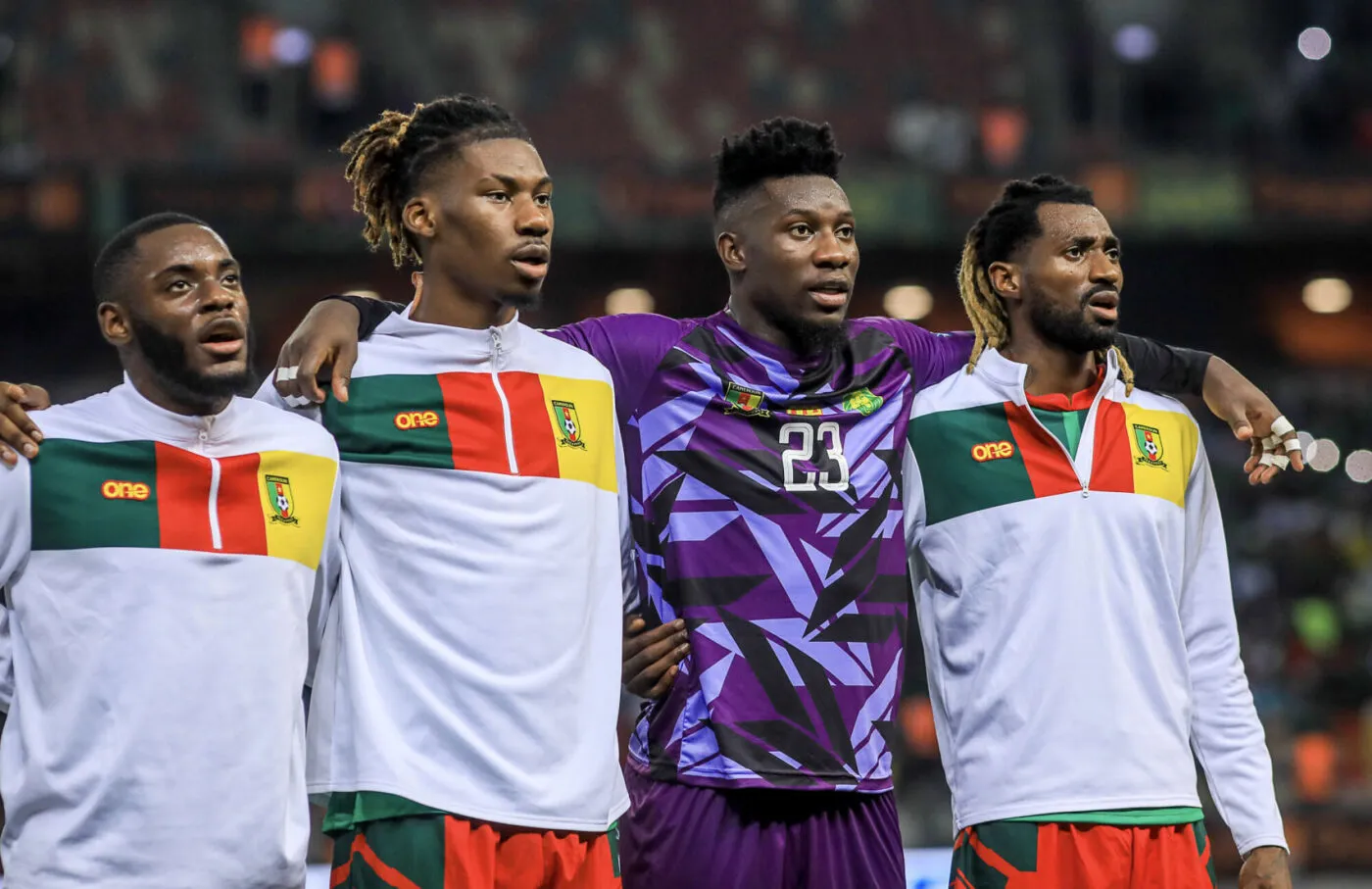 Cameroon team sings national anthem (Andre Onana, goalkeeper of Cameroon second from right and Frank Anguissa, captain of Cameroon on the far right) during the 2026 FIFA World Cup Qualifiers between Cameroon and Mauritius at Japoma Stadium in Douala, Cameroon on 17 November 2023 - Photo by Icon sport