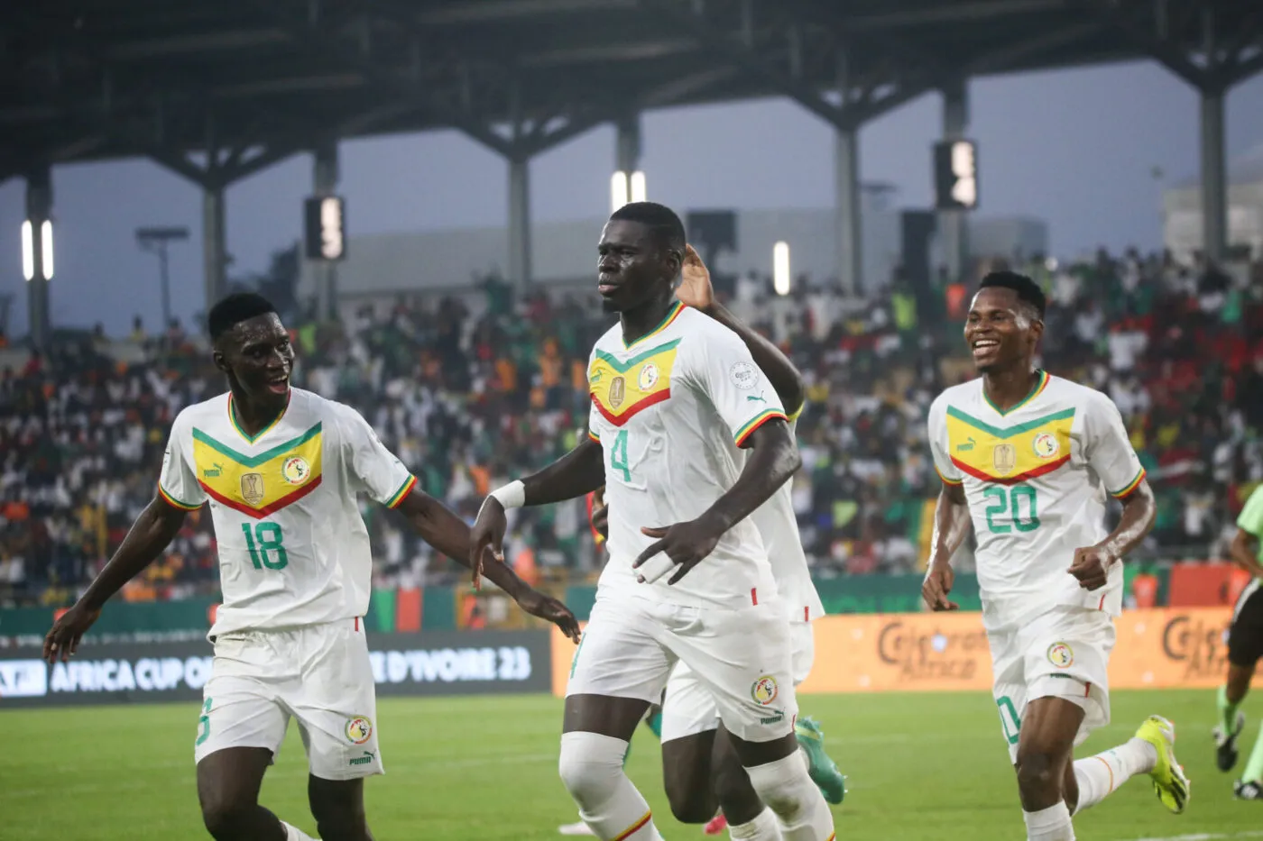 Abdoulaye Seck of Senegal, Habib Diallo and Ismaila  of Senegal Sarr celebrate after scores  during the 2023 Africa Cup of Nations match between Guinea and Senegal at Charles Konan Stadium in Yamoussoukro, Cote dIvoire on 23 January 2024 - Photo by Icon Sport?