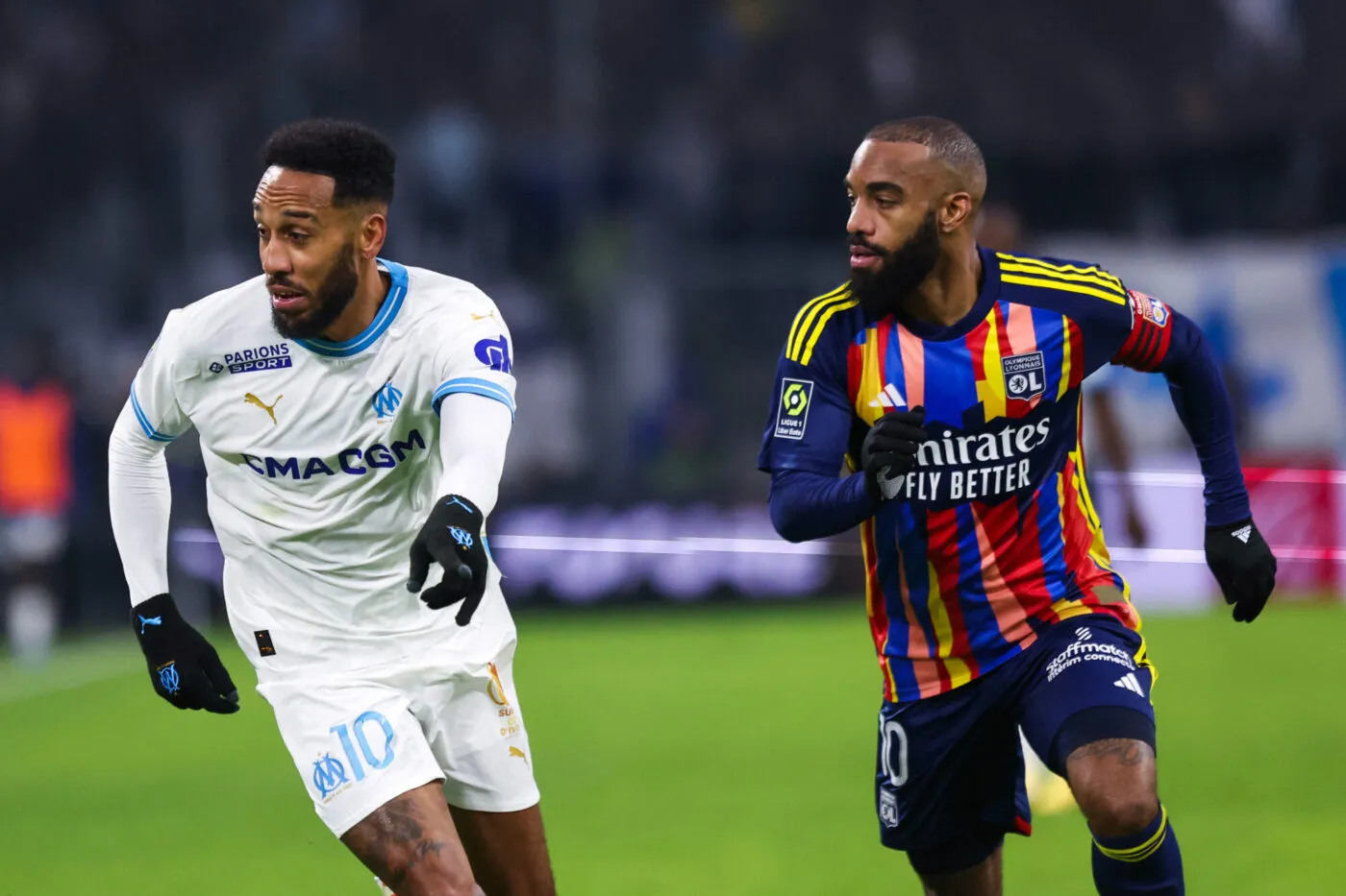 Pierre Emerick AUBAMEYANG of Marseille and Alexandre LACAZETTE of Lyon during the Ligue 1 Uber Eats match between Olympique de Marseille and Olympique Lyonnais at Orange Velodrome on December 6, 2023 in Marseille, France. (Photo by Johnny Fidelin/Icon Sport)