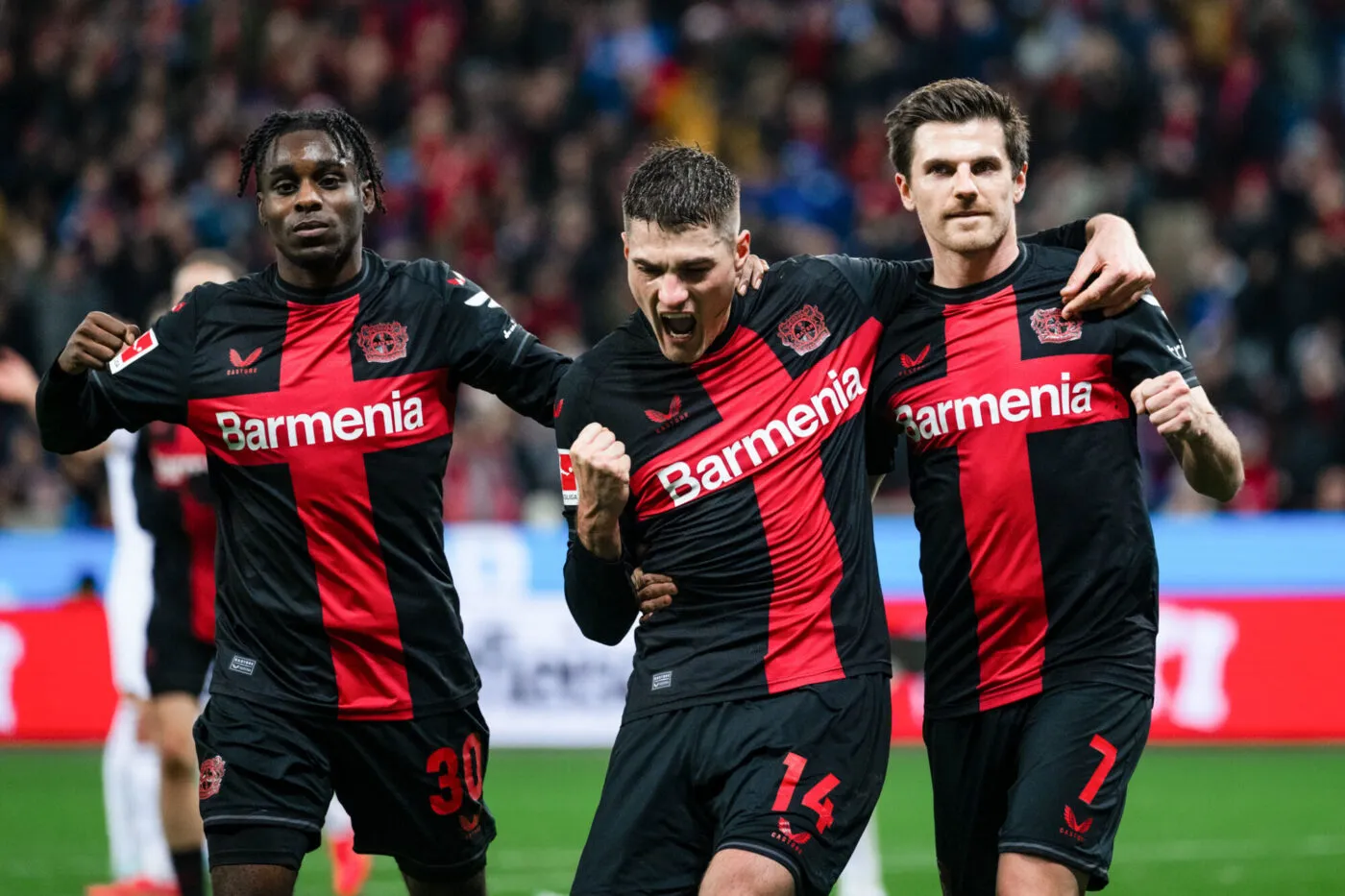 20 December 2023, North Rhine-Westphalia, Leverkusen: Soccer: Bundesliga, Bayer Leverkusen - VfL Bochum, Matchday 16, BayArena. Leverkusen's Jeremie Frimpong (l-r), goalscorer Patrik Schick and Jonas Hofmann celebrate after scoring to take a 1-0 lead. Photo: Marius Becker/dpa - IMPORTANT NOTE: In accordance with the regulations of the DFL German Football League and the DFB German Football Association, it is prohibited to utilize or have utilized photographs taken in the stadium and/or of the match in the form of sequential images and/or video-like photo series. - Photo by Icon sport