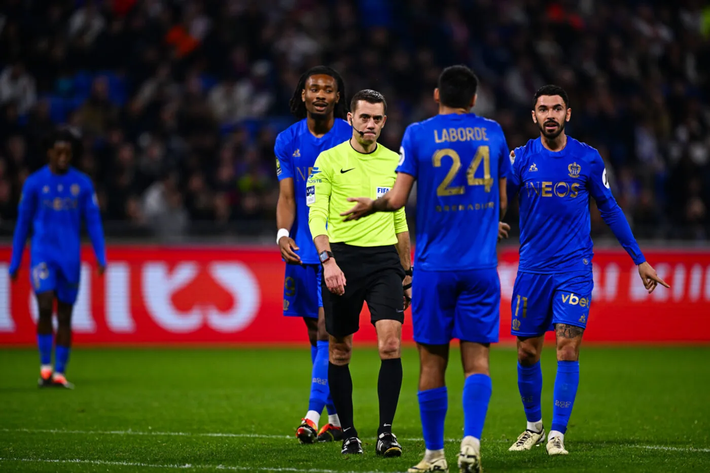 Referee Clement TURPIN , Morgan SANSON of Nice, Khephren THURAM of Nice and Gaetan LABORDE of Nice during the Ligue 1 Uber Eats match between Olympique Lyonnais and Olympique Gymnaste Club Nice at Groupama Stadium on February 16, 2024 in Lyon, France. (Photo by Baptiste Fernandez/Icon Sport)