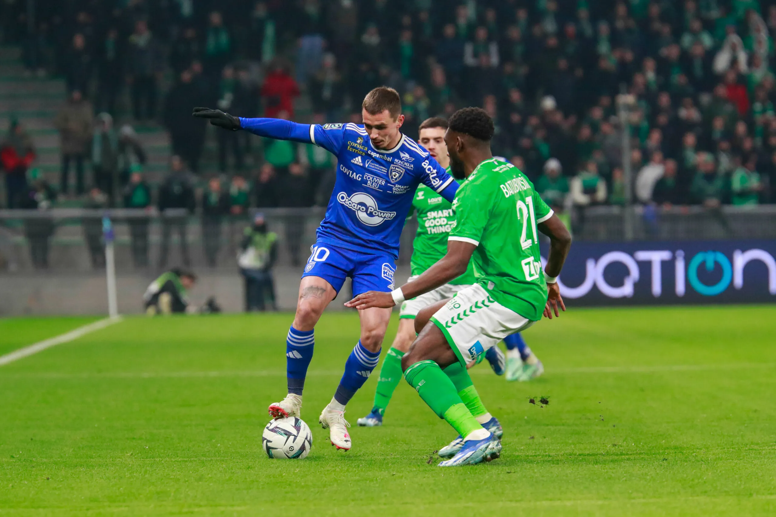 Migouel ALFARELA of Bastia and Buduka BATUBINSIKA of Saint Etienne during the Ligue 2 BKT match between Association Sportive de Saint-Etienne and Sporting Club Bastiais at Stade Geoffroy-Guichard on December 19, 2023 in Saint-Etienne, France. (Photo by Romain Biard/Icon Sport)   - Photo by Icon Sport