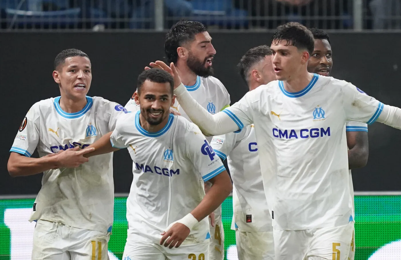 15 February 2024, Hamburg: Soccer: Europa League, knockout round, intermediate round, first leg, Shakhtar Donetsk - Olympique Marseille, at the Volksparkstadion. Marseille's goalscorer Iliman Ndiaye (2nd from left) celebrates with Marseille's Amine Harit (l) and Marseille's Leonardo Balerdi (r) after scoring to make it 1-2. Photo: Marcus Brandt/dpa   - Photo by Icon Sport   - Photo by Icon Sport
