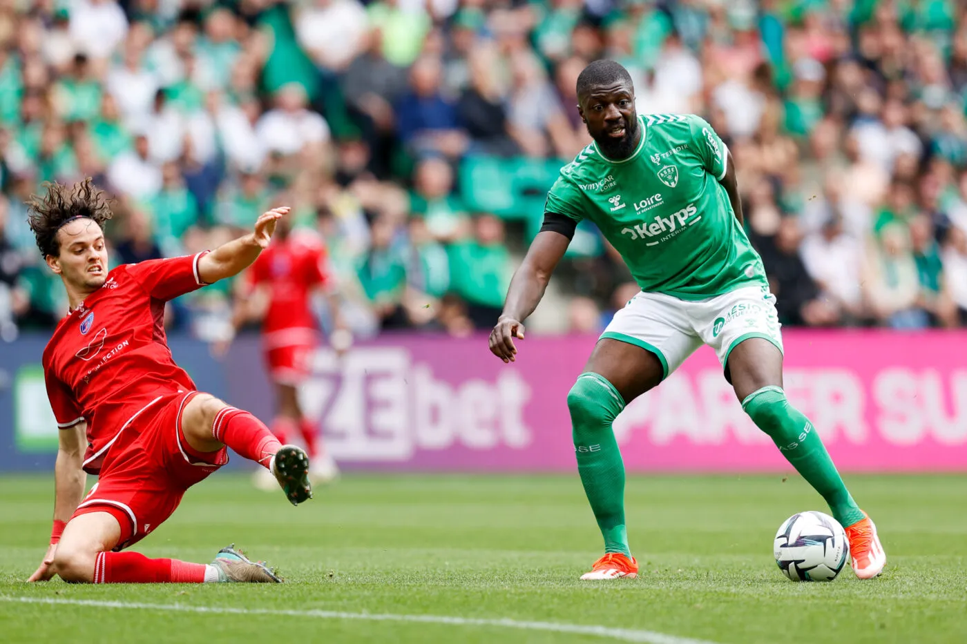 15 Gabriel BARES (usc) - 09 Ibrahim SISSOKO (asse) during the Ligue 2 BKT match between Saint-Etienne and Concarneau at Stade Geoffroy-Guichard on April 6, 2024 in Saint-Etienne, France.(Photo by Loic Baratoux/FEP/Icon Sport)   - Photo by Icon Sport