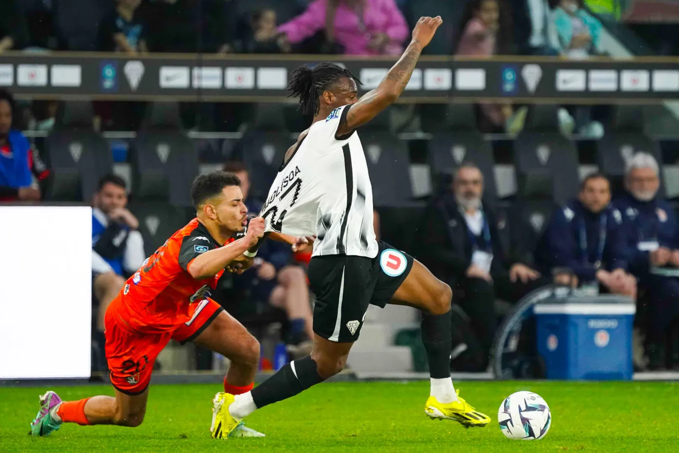 Lilian RAO-LISOA of ANGERS and Amin CHERNI of Laval during the Ligue 2 BKT match between Angers and Laval at Stade Raymond Kopa on April 6, 2024 in Angers, France.(Photo by Eddy Lemaistre/Icon Sport)   - Photo by Icon Sport