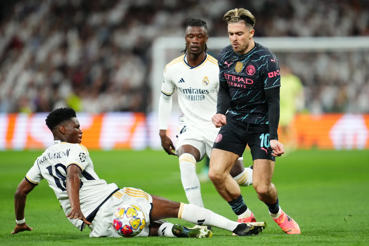 Jack Grealish of Manchester City and Eduardo Camavinga and Aurelien Tchouameni of Real Madrid during the UEFA Champions League match, Quarter-finals, first leg, between Real Madrid and Manchester City played at Santiago Bernabeu Stadium on April 9, 2024 in Madrid Spain. (Photo by Bagu Blanco / Pressinphoto / Icon Sport)   Photo by Icon sport   - Photo by Icon Sport