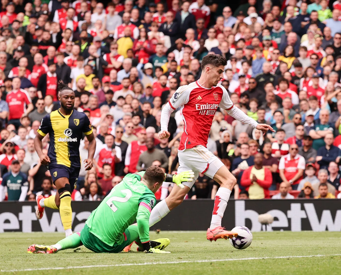 London, England, 4th May 2024. Kai Havertz of Arsenal goes down under the challenge of Mark Travers of Bournemouth during the Premier League match at the Emirates Stadium, London. Picture credit should read: David Klein / Sportimage   - Photo by Icon Sport