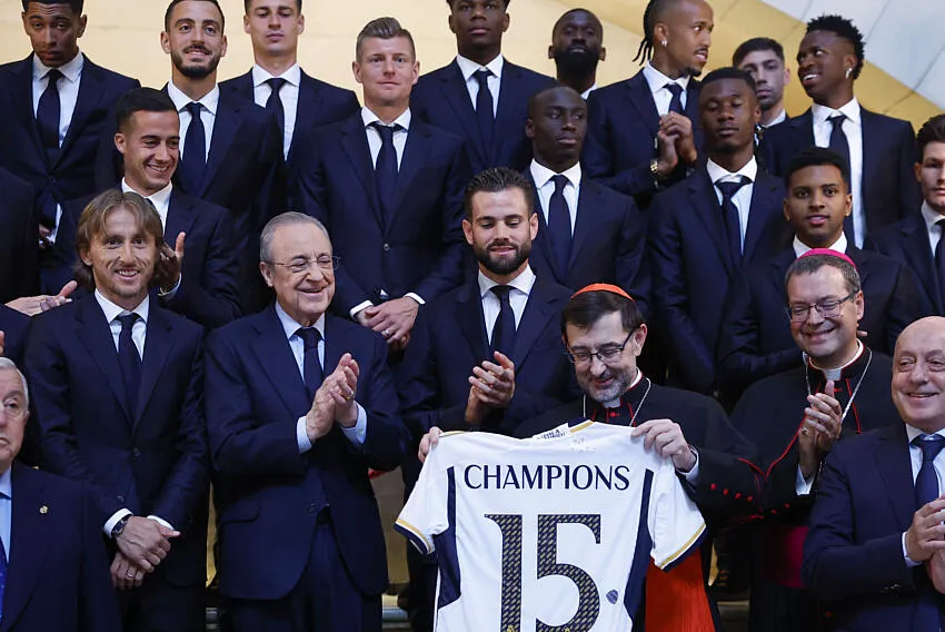 Real Madrid's President Florentino Perez (2-L) offers a replica of the UEFA Champions League trophy to the Archbishop of Madrid Jose Cobo (3-R) upon arrival to La Almudena Cathedral, in Madrid, Spain, 02 June 2024. Real Madrid won the UEFA Champions League 2024 final soccer match against Borussia Dortmund on 01 June 2024. Efe/ABACAPRESS.COM// Chema Moya POOL - Photo by Icon Sport